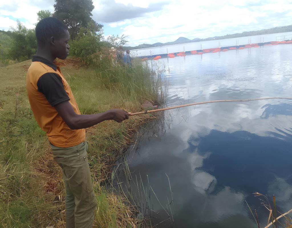 Local fisherman, Iverne Mapuzire is one of many who rely heavily on the Matezva dam, a now polluted water source. Photo: Tatenda Chitagu